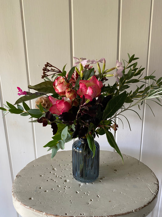 Ribbed Glass Bud Vase in Dark Blue & a posy of seasonal flowers