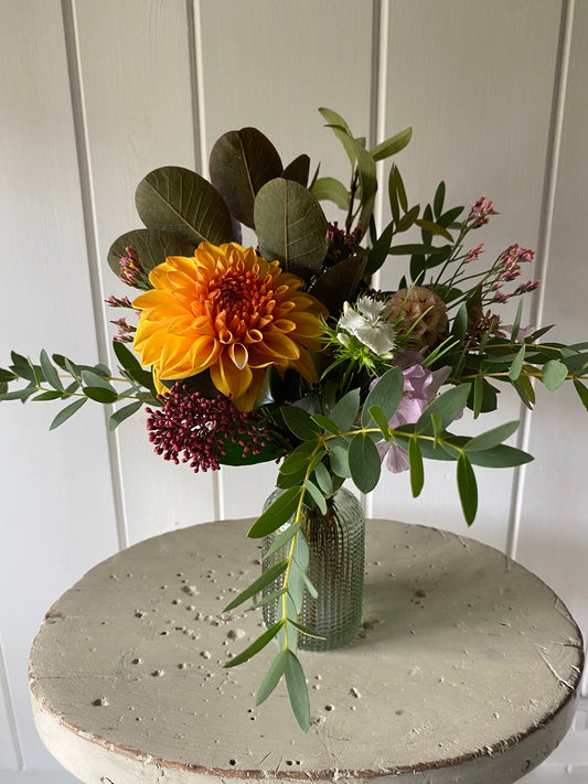 Feathered Glass Bud Vase in Green & a posy of seasonal flowers